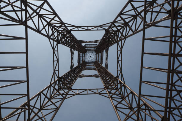 the steel structure of tower on blue sky background so tall and high building