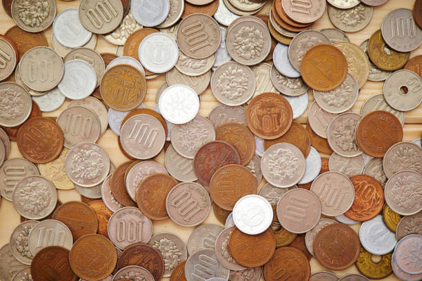 istock Chinese yuan coins 947714724