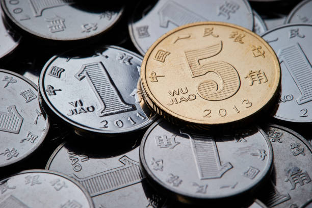 istock Chinese yuan coins 947715424