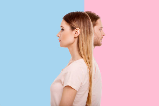 istock Beautiful couple looking into different directions 947715634