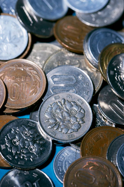 istock Japanese yen coins 947715694