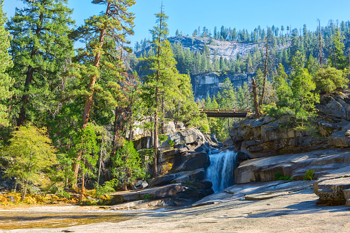 The Silver Apron is a smooth cascade over polished granite, between Nevada and Vernal Falls at sunny autumn morning, Yosemite National Park, California, United States.