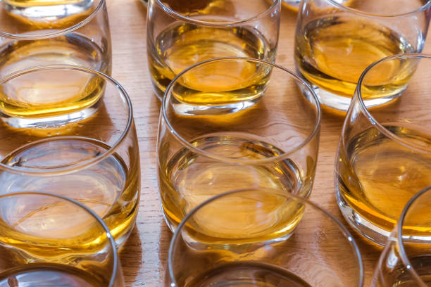 istock Glasses are filled with whiskey on the table 947725660