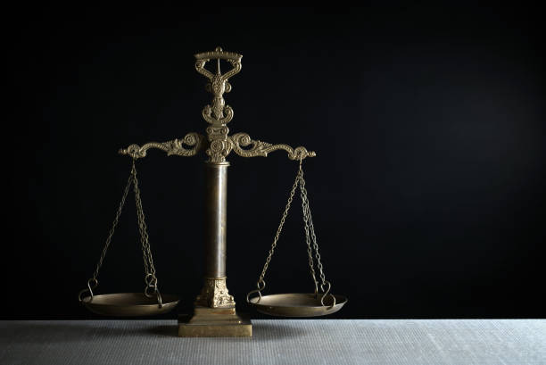 istock Gold brass balance scale 947726584