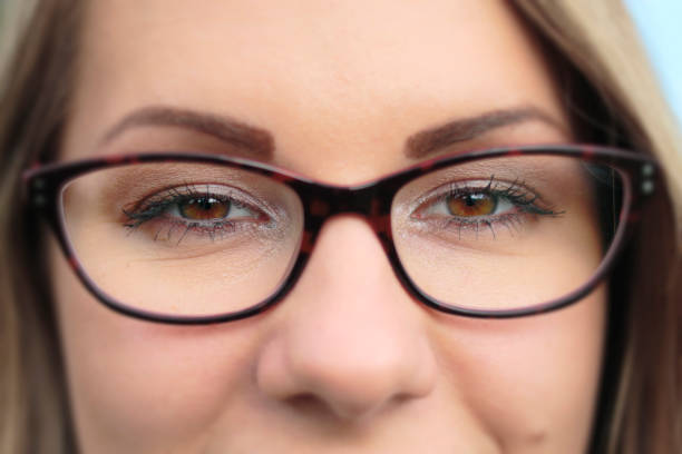 istock Focus on brown eyes tortoiseshell spectacles close up 947728748