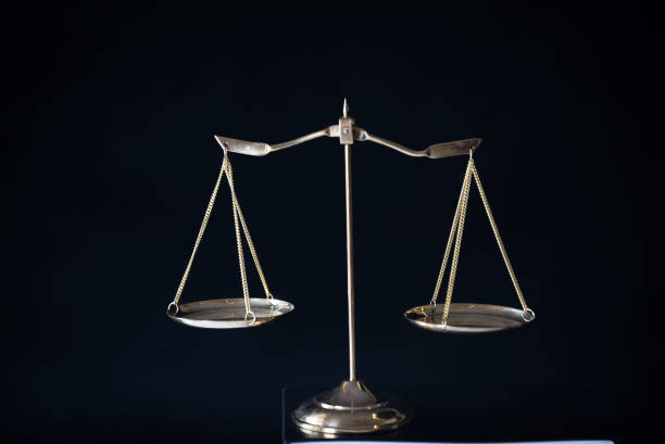 istock Gold brass balance scale 947728868