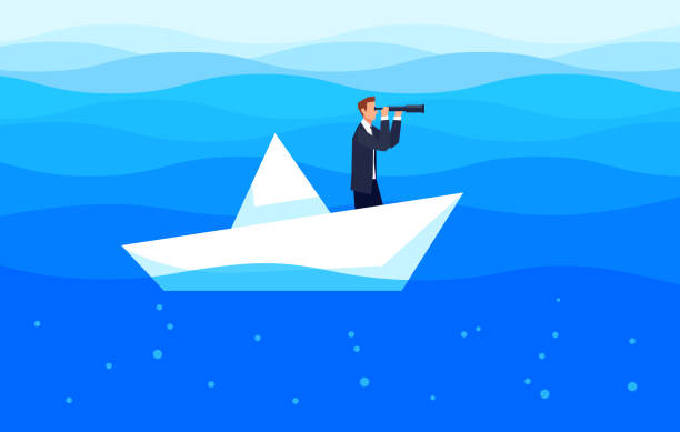 istock Investor. Businessman with a telescope. 947739676