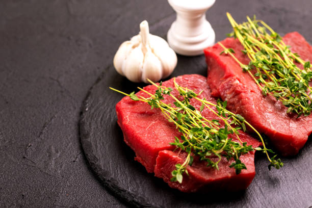istock Fresh raw beef tenderloin and marbled steaks with seasoning 947751678