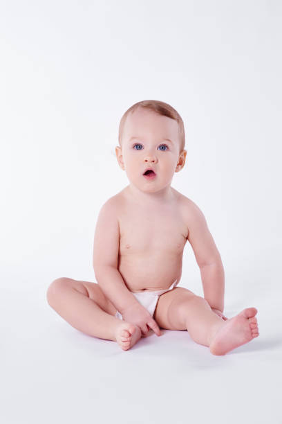 istock Confused baby sitting at studio shot 947756484