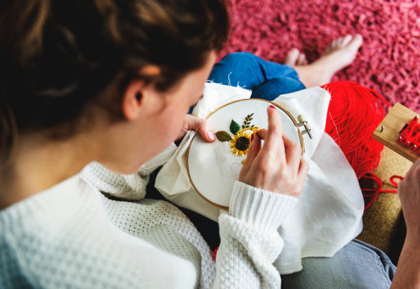 Young girl doing some needlework
