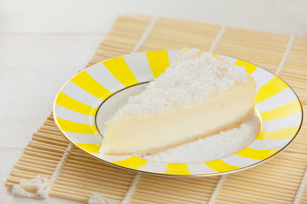 istock delicious cheesecake with coconut on  plate 947769052