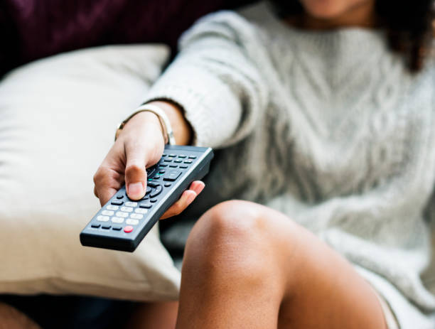 istock Couple watching a tv show together 947803678