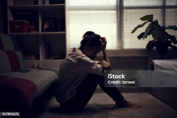 Business Woman Is Depressed She Felt Stressed And Alone In The House Stock Photo - Download Image Now