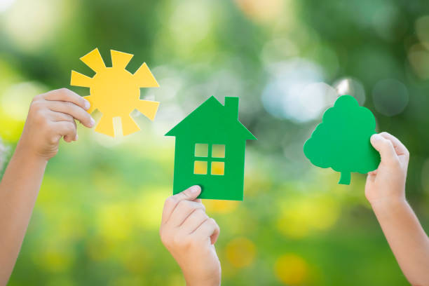 istock Paper house in hand 947815394