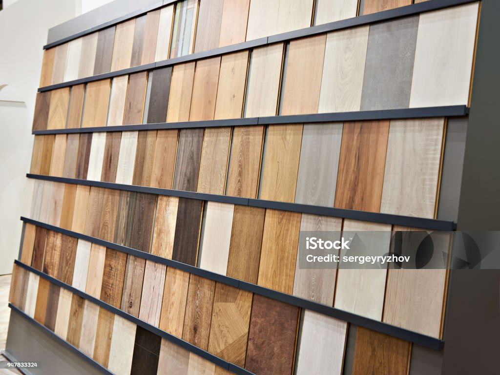 Samples of wooden laminate panels Samples of wooden laminate panels in the building store Flooring Stock Photo