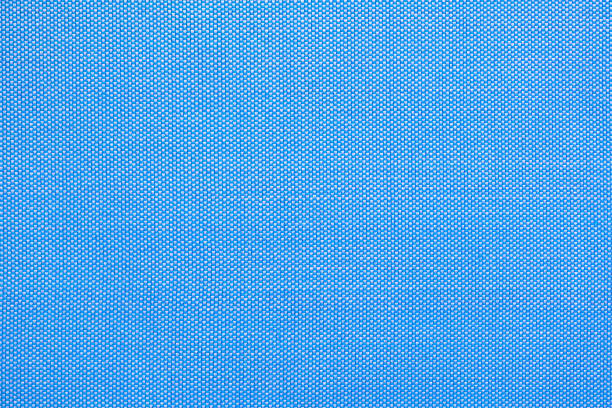 Blue cotton shirt Pinpoint texture. Blue Cotton Pinpoint Oxford fabric texture is commonly used to manufacture men's dress shirts, for everyday work shirts. Blue cotton shirt texture. oxford england stock pictures, royalty-free photos & images