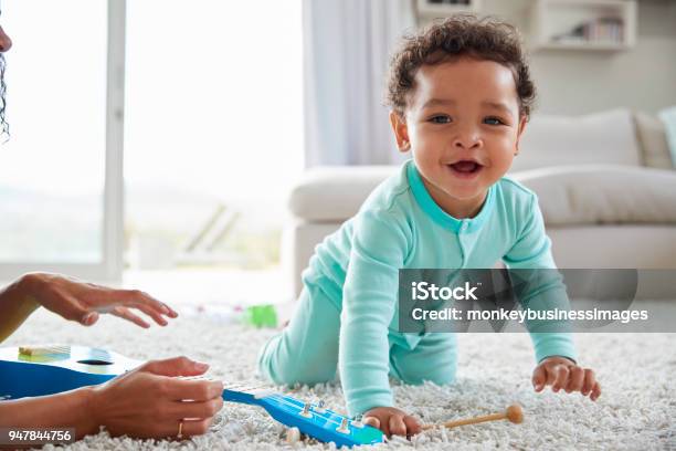 Mixed Race Mum And Toddler Son Playing At Home Close Up Stock Photo - Download Image Now