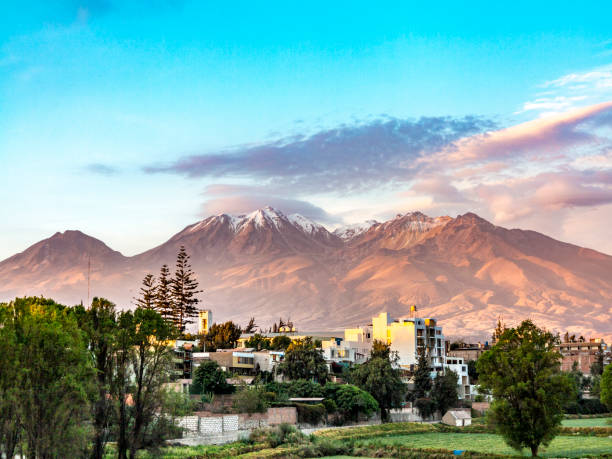Arequipa, Peru with its iconic volcano Chachani in the background city of Arequipa, Peru with its iconic volcano Chachani in the background arequipa province stock pictures, royalty-free photos & images