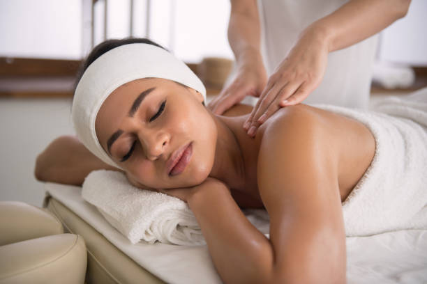 istock Nice relaxed woman having a massage 947854290