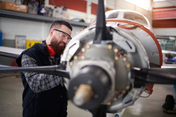 istock Aircraft mechanic in the hangar 947873898