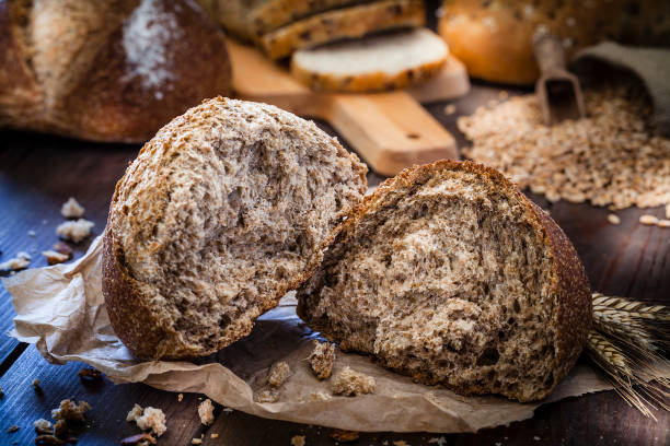 Brown bread on rustic wooden table