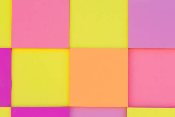 istock wooden panel made of multicolored squares. Abstract background 947887352
