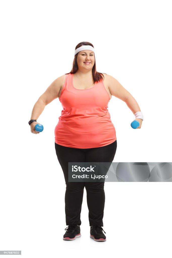 Overweight woman exercising with dumbbells Full length portrait of an overweight woman exercising with dumbbells isolated on white background 20-29 Years Stock Photo