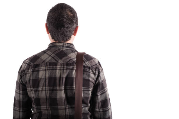 istock Back View of a Standing Young Man 947893138