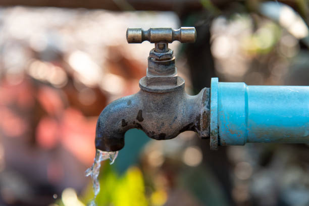 istock Close up Faucet and Water Drops fall 947900976