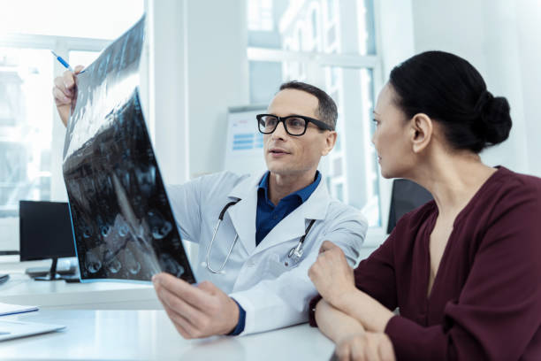 istock Professional nearologist holding a mri scan 947913984