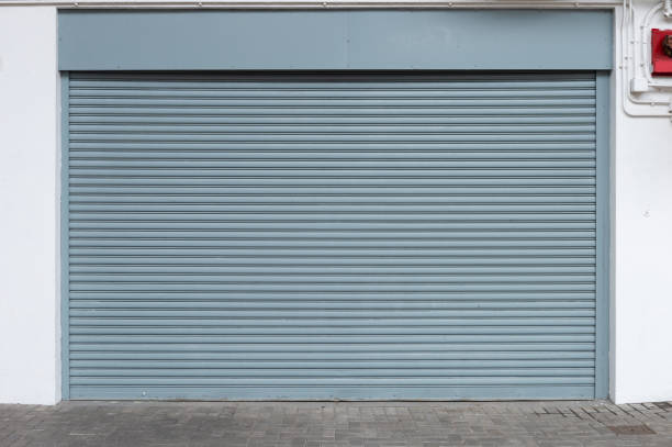 istock sidewalk by street wall & door 947915150