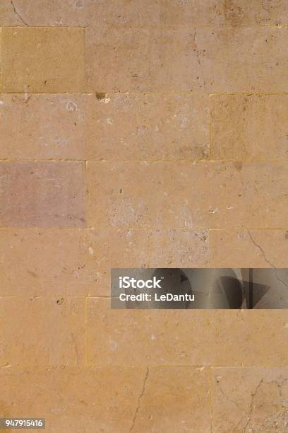 Yellow Aged Sandstone Brick Wall Background Stock Photo - Download Image Now - Architecture, Backgrounds, Brick