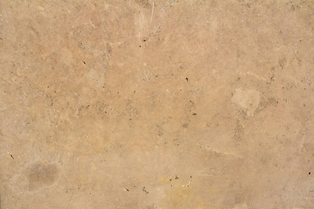 istock yellow aged sandstone brick wall background 947916106