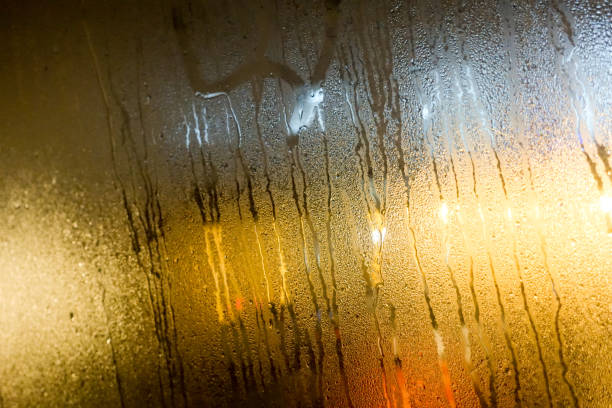 istock Foggy glass and rain drops 947917806