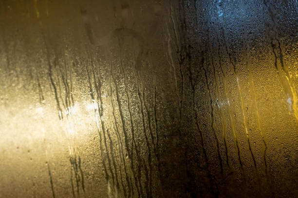 istock Foggy glass and rain drops 947917814