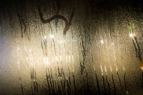 istock Foggy glass and rain drops 947917830