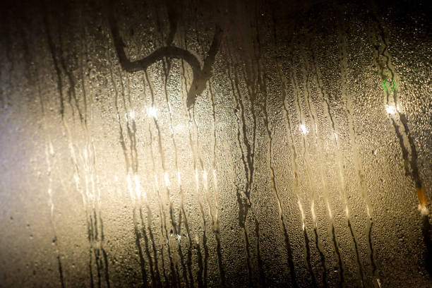 istock Foggy glass and rain drops 947917840