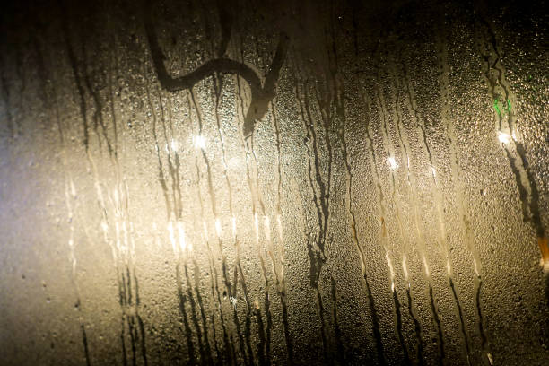 istock Foggy glass and rain drops 947917842