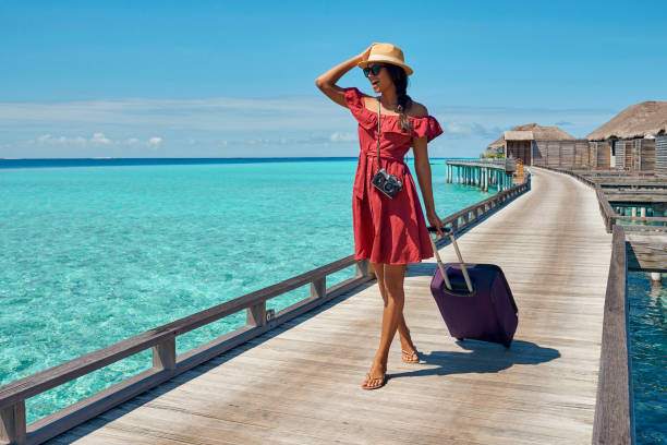 istock beautiful young woman traveler 947919680