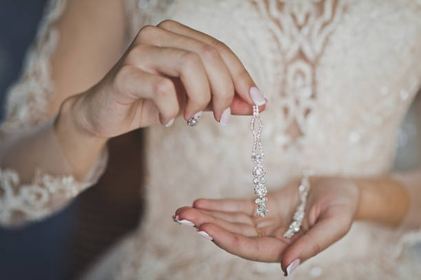 istock The bride shows off her jewelry before putting 680. 947925246