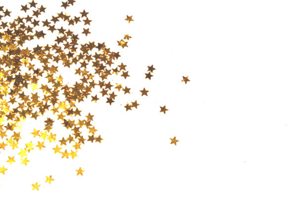 Golden glitter and stars on white background . Round frame.