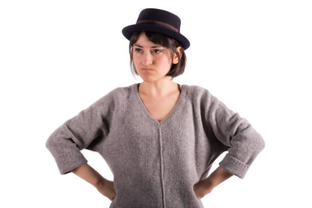 istock Girl with Hands on Hips Looking Discontent 947951034