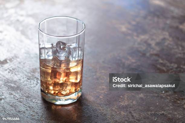 Glass Of Whiskey With Ice On Black Background Stock Photo - Download Image Now - Alcohol - Drink, Bottle, Brandy