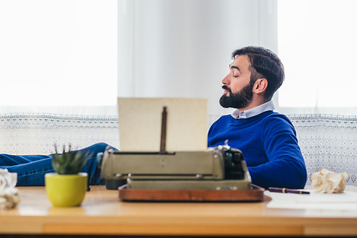 Man Write Books Man Writing Book On A Retro Typewriter Stock Photo - Download Image Now ...