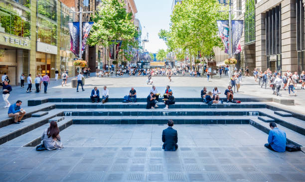 Sydney, Australia - Nov 14, 2017: A view of the iconic Martin Place; a pedestrian mall flanked by large financial cooperations. Features people walking about and those relaxing and having lunch.