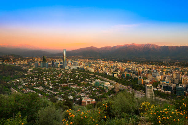 View of Santiago de Chile with Los Andes mountain Range View of Santiago de Chile with Los Andes mountain Range in the back at sunset sanhattan stock pictures, royalty-free photos & images