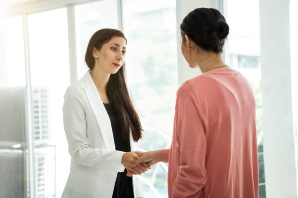istock Businesswoman making handshake agreement in office. concept cooperation. 947963848
