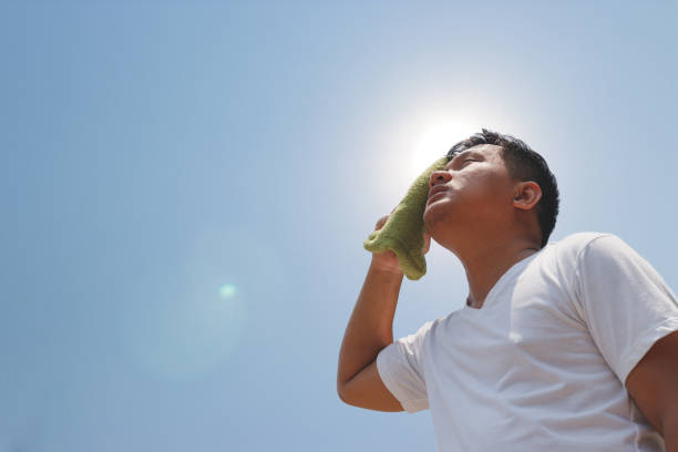 istock Young man and heat stroke. 947964672
