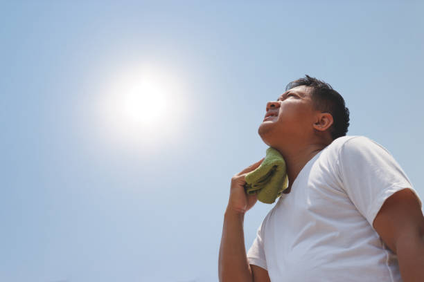 istock Young man and heat stroke. 947964728