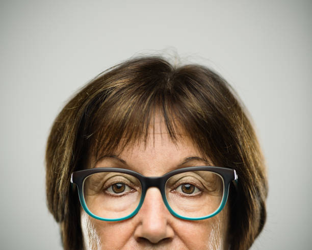 istock Real serious senior woman portrait 947970098